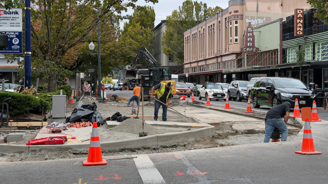 Work crews remake bus stop sidewalk in downtown Olympia