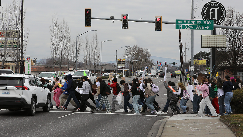 ‘Stand united’ Pasco students walk out of class to protest ICE