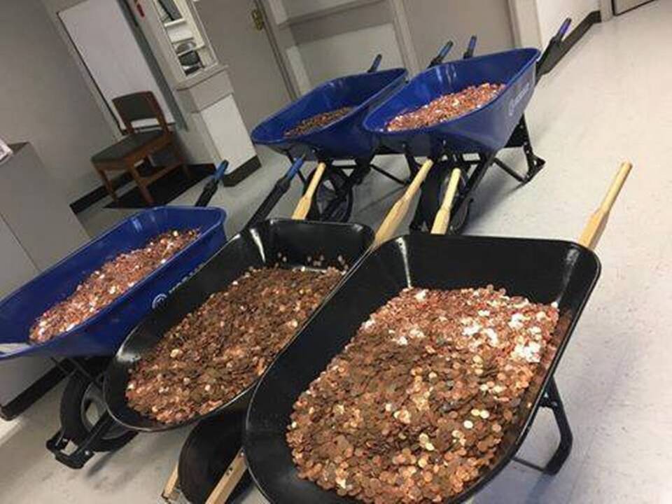 Sticking it to the DMV, with 5 wheelbarrows of pennies
