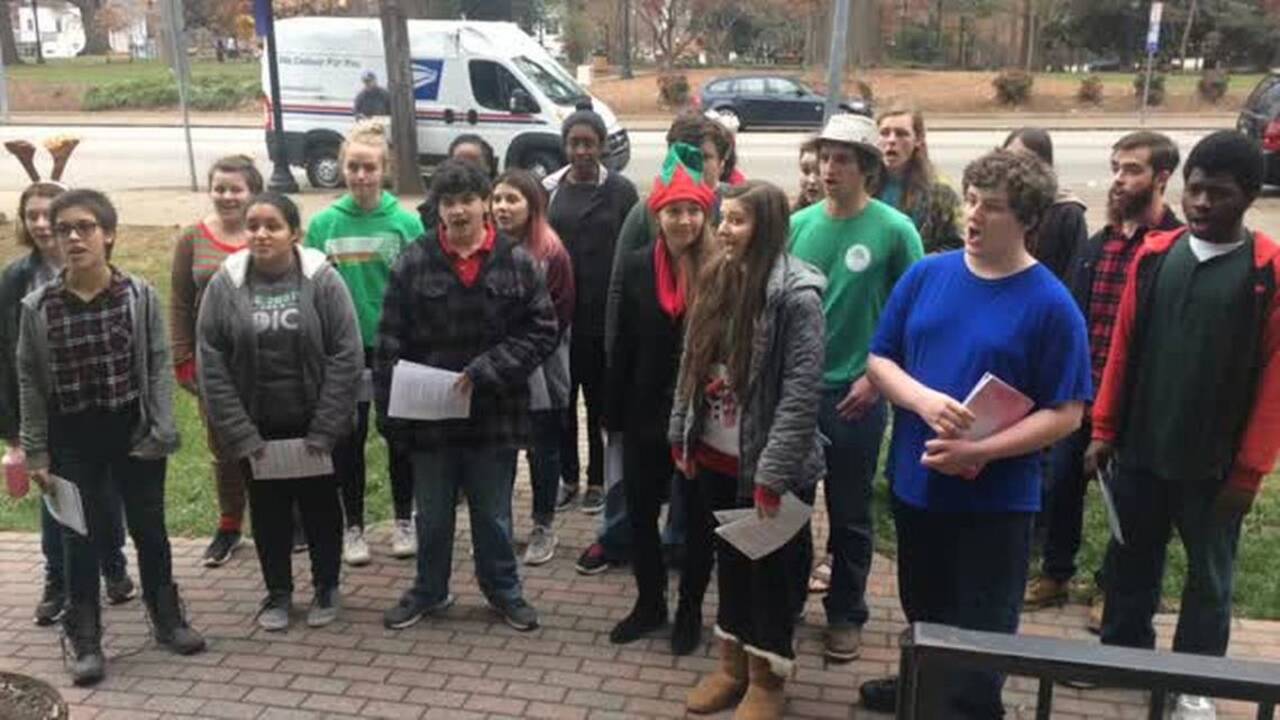 Longleaf School of the Arts chorus takes caroling downtown 