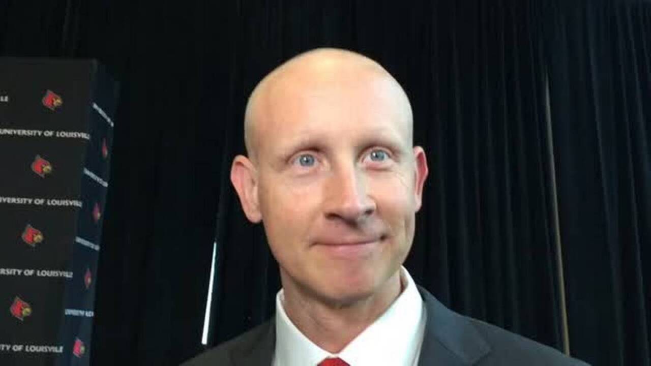 What does new Louisville coach think of John Calipari?