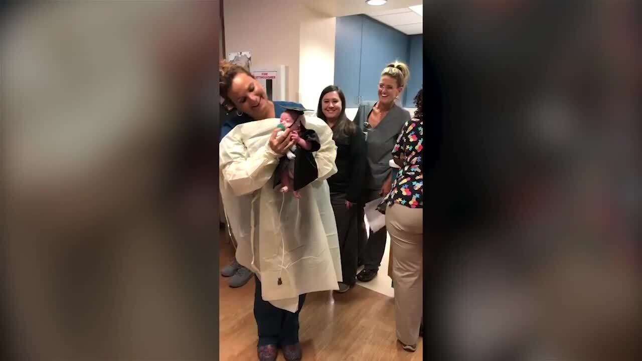 Baby dons tiny cap and gown as he ‘graduates’ from NICU