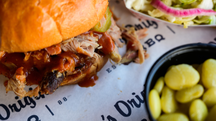 Building Pork Sandwiches at Moe's Original BBQ