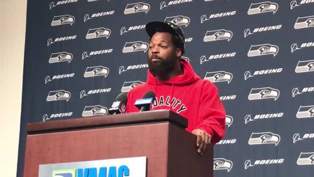 Michael Bennett says he will continue to sit during anthem before Seahawks games