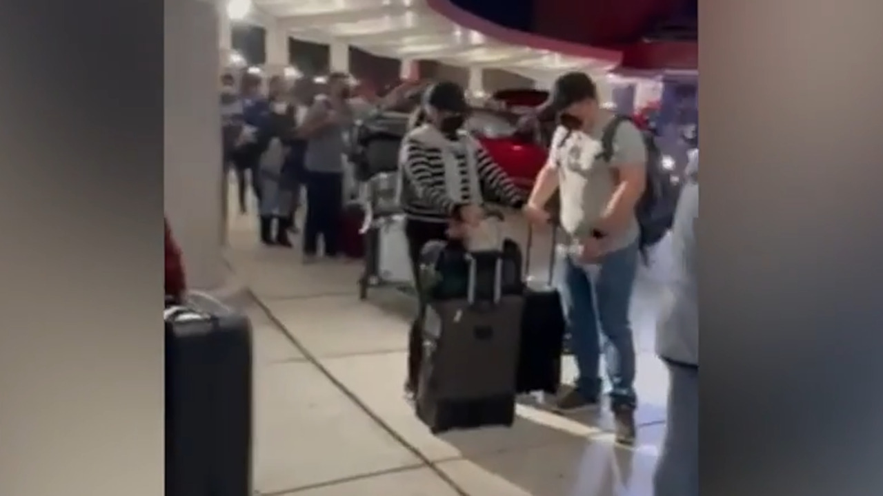 Long lines at airports as flight disruptions continue