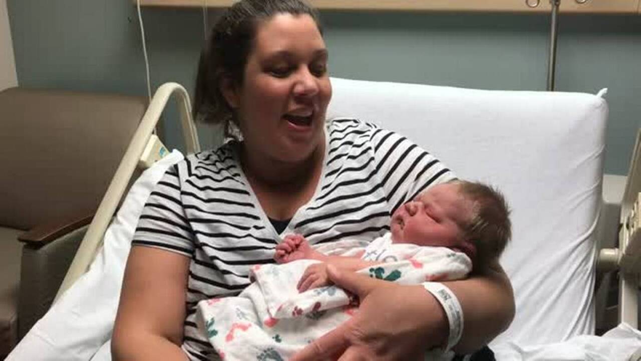 Parents welcome scale-tipping newborn