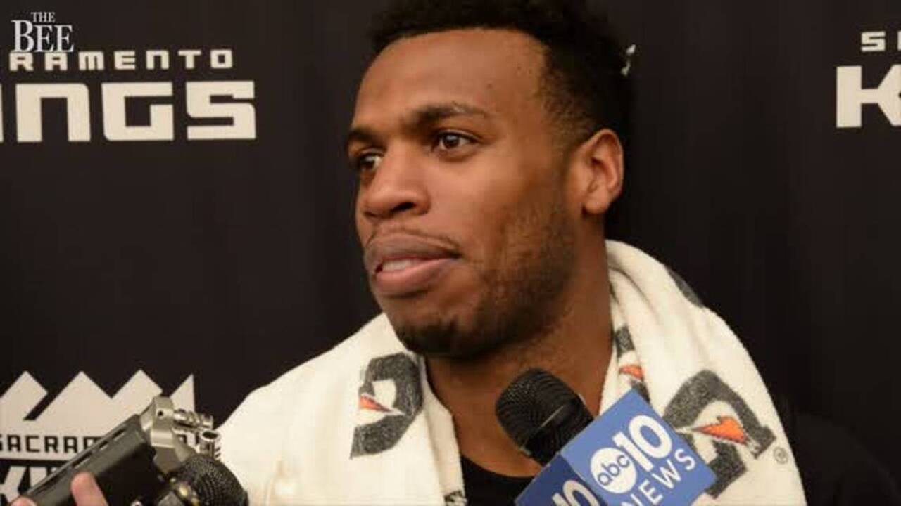 Buddy Hield and Tyreke Evans talk after first practice with Kings in 2017