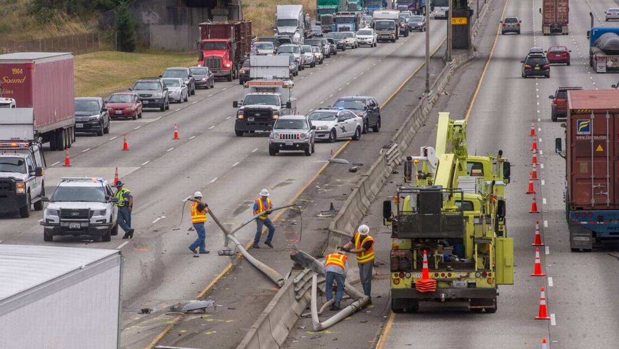 Semi hit I-5 center barrier causing miles-long backup | Tacoma News Tribune