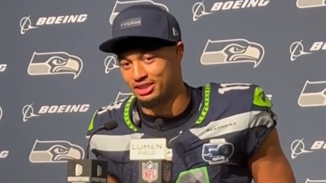 How Seahawks’ Jaxon Smith-Njigba was sitting a helmetless target on Texans bench