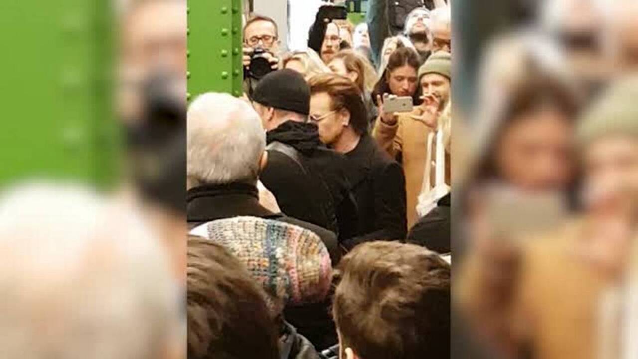 U2 surprises Berlin subway commuters with impromptu set