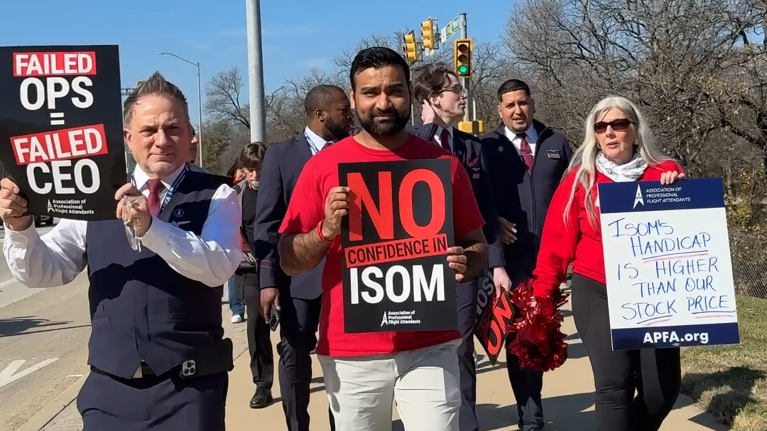 Frustrated American Airlines flight attendants held a protest outside of their Fort Worth Headquarters