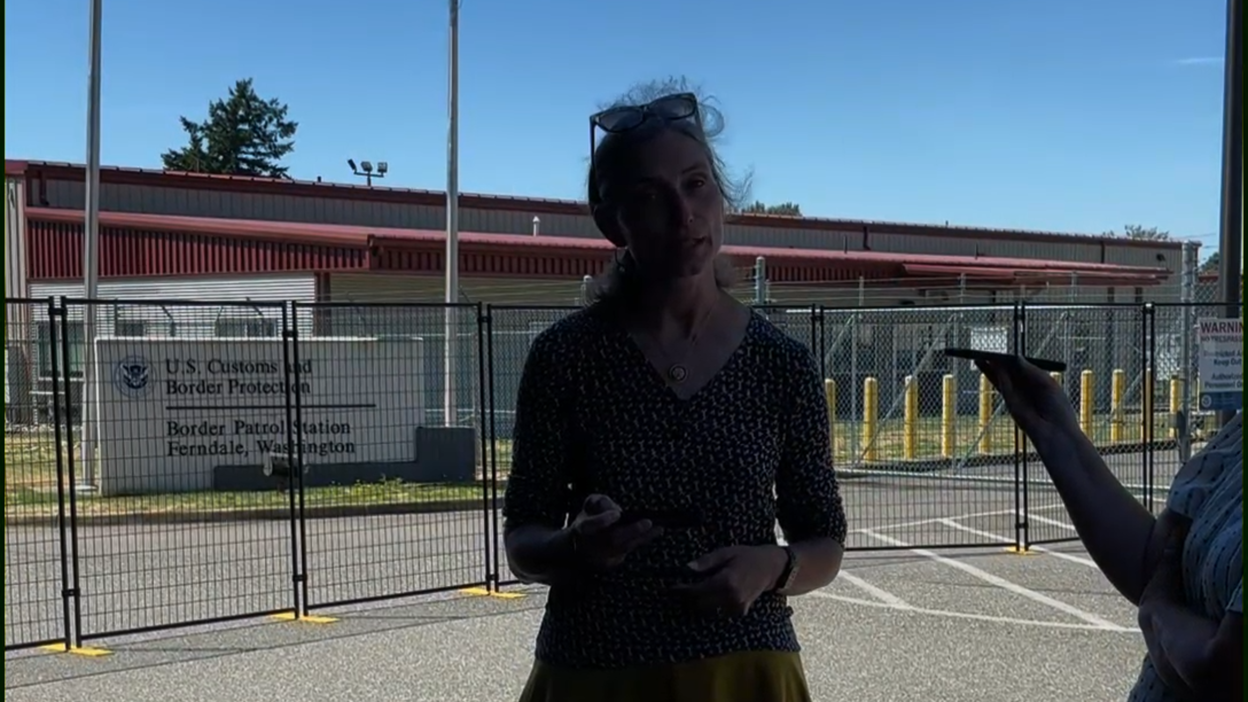 U.S. Rep. Maxine Dexter speaks outside of Ferndale U.S. Customs and Border Patrol