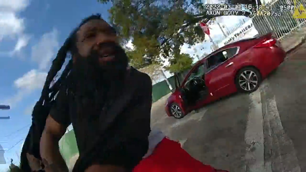 Video of man killed by Miami cop shows officer on ground as another cop fires fatal shot