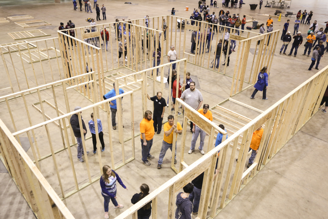 Watch Habitat for Humanity workers build homes at Century II