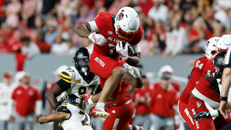 NC State's Gause hurdles the defense