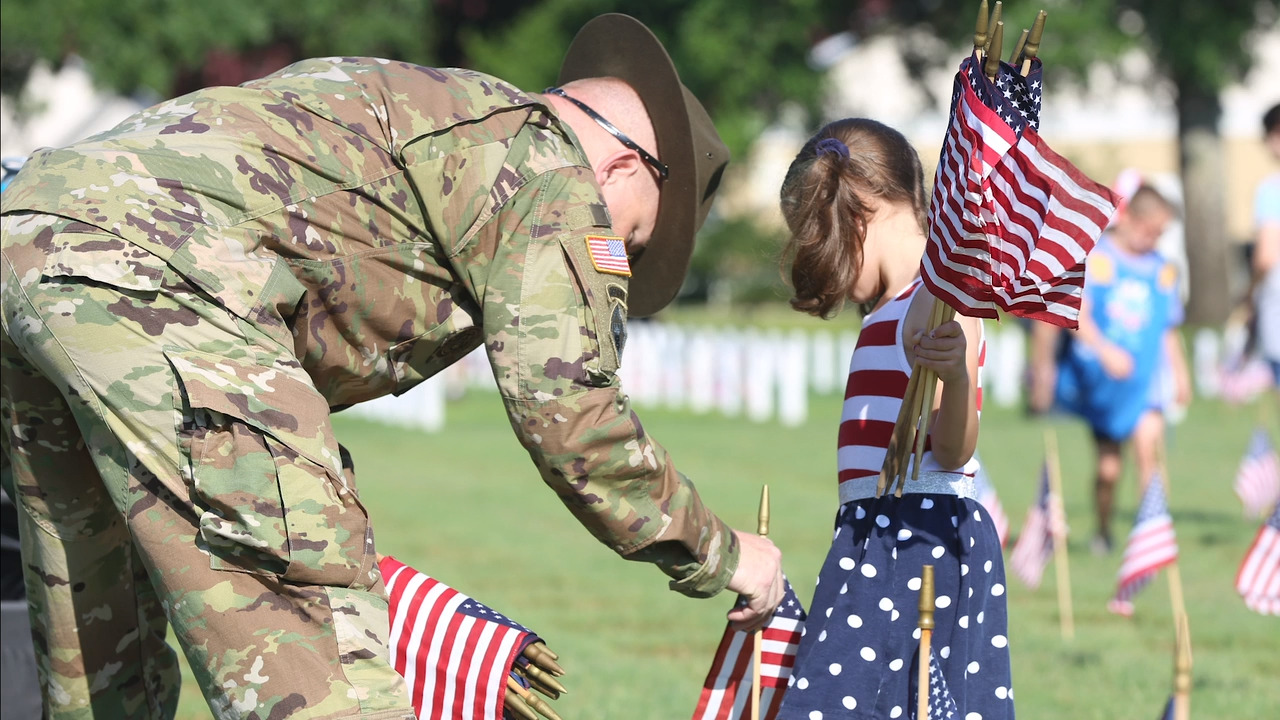 Honoring those who gave all: Biloxi National Cemetery decoration of the graves