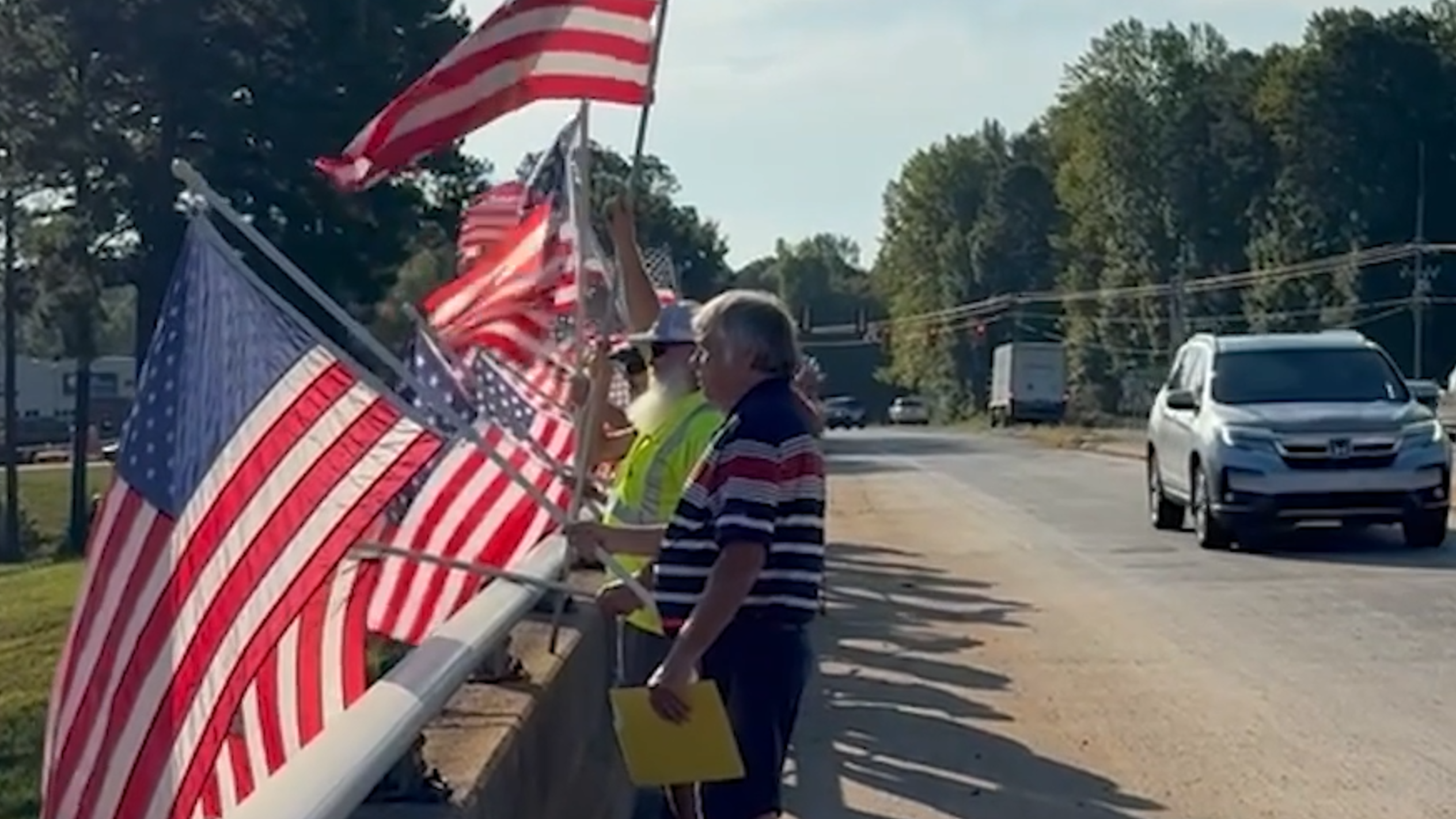 Flags wave over Interstate 77 in Fort Mill to remember 9-11