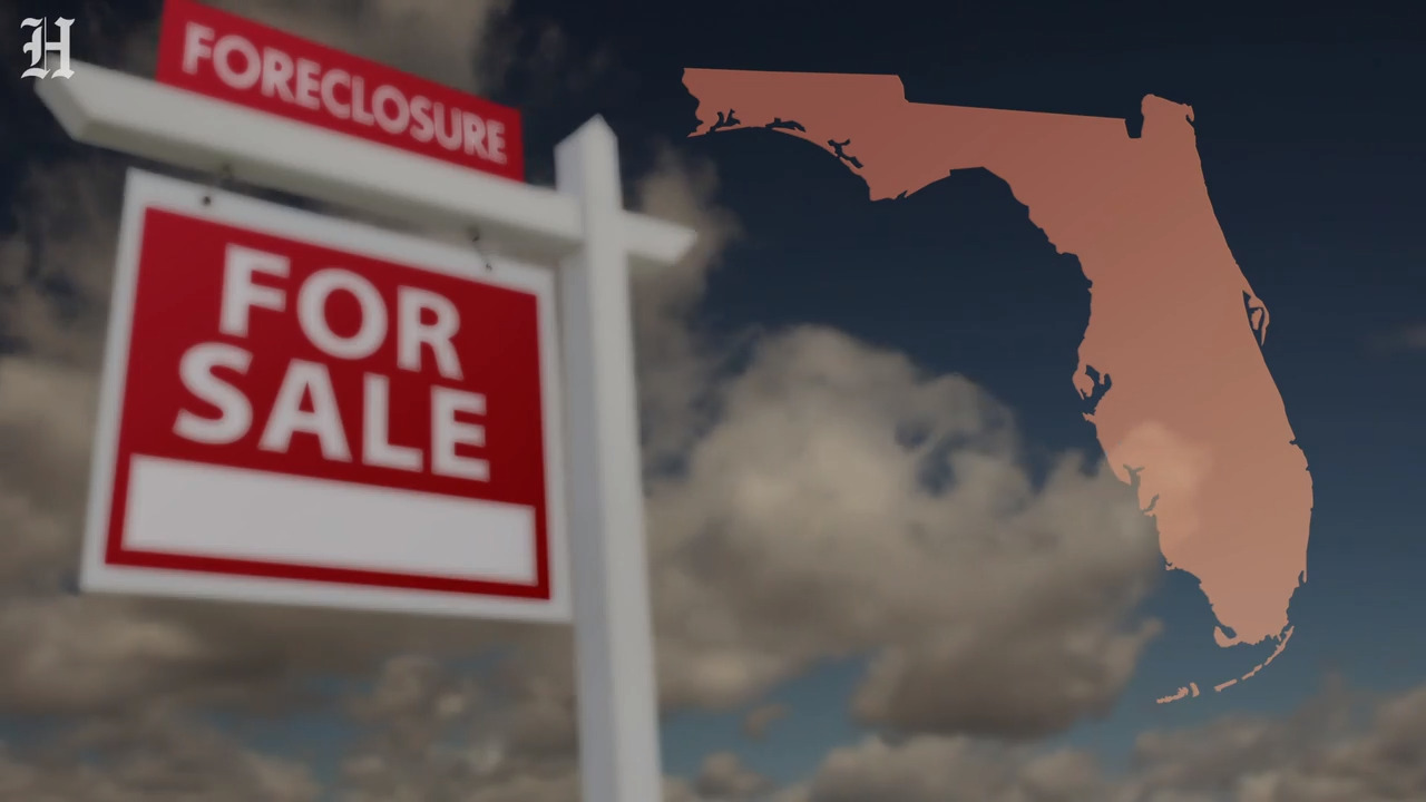 What is to blame for the high foreclosure rates in South Florida?
