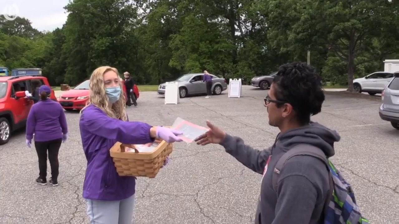Novant Health distributes free, reusable masks to the public