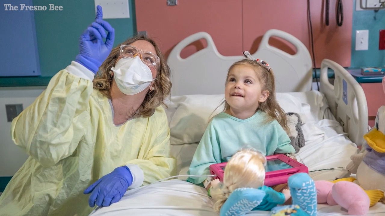 How do specialists interact with COVID-positive kids at Valley Children’s Hospital?