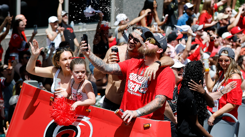 Canes players have fun celebrating Stanley Cup victory during parade