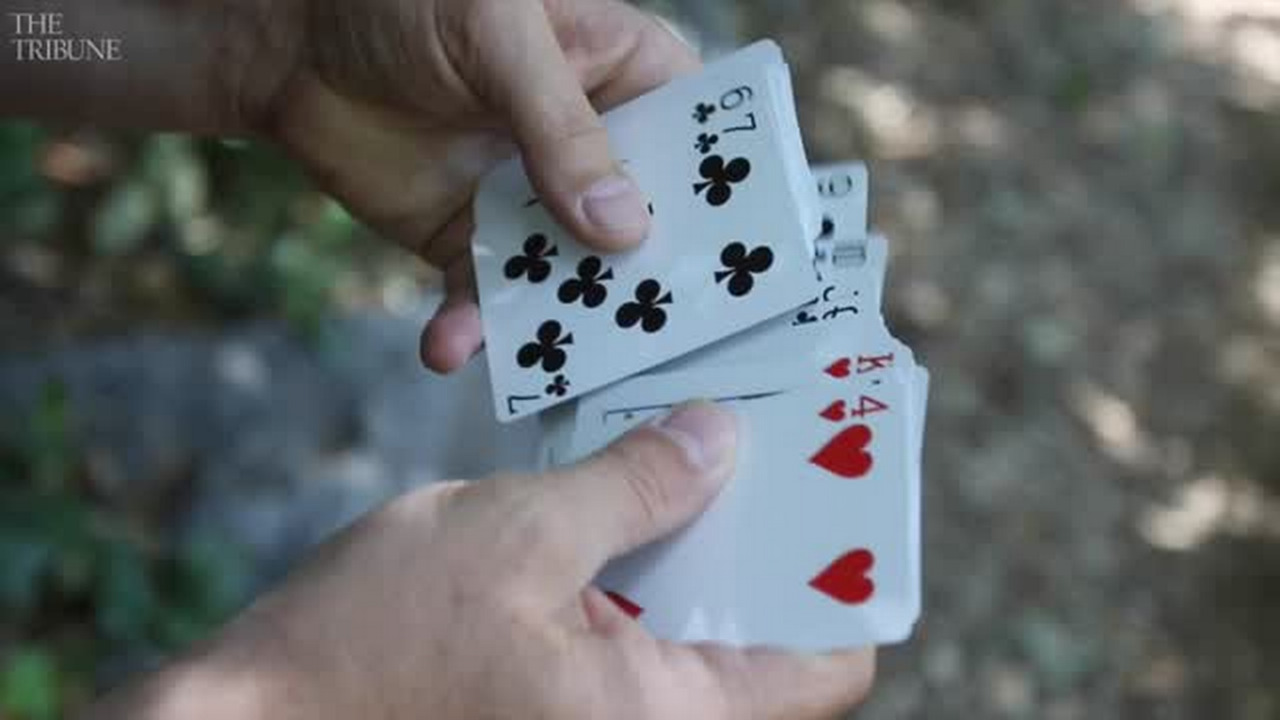 Vegetable chopper? Weed cutter? Watch what a SLO magician can do with a deck of cards