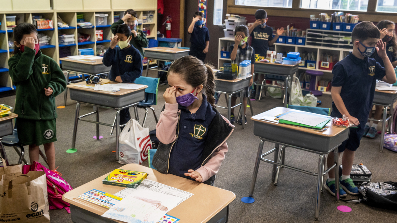 Temperature checks. Spread out desks. How the first day went in a reopened Sacramento school
