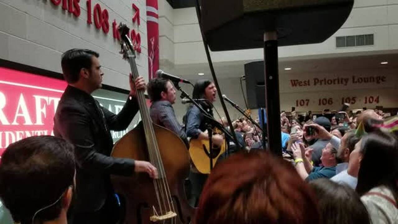 The Avett Brothers perform at a pop-up stage in PNC Arena