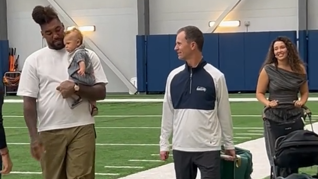 Leonard Williams with his son Zion upon signing his $90M Seahawks extension