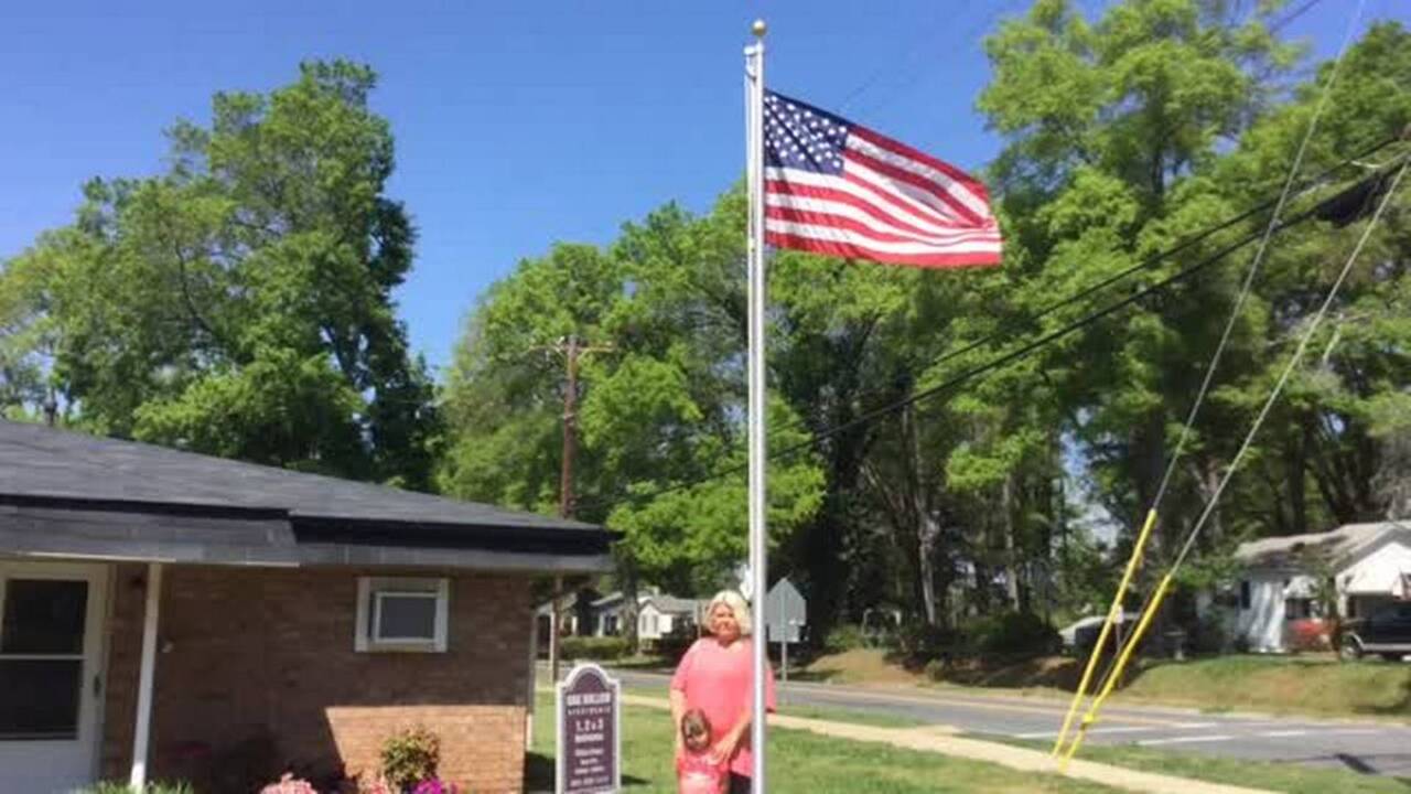 Patriotism beats vandalism. Flag, flagpole again stand proudly at Rock Hill apartment complex