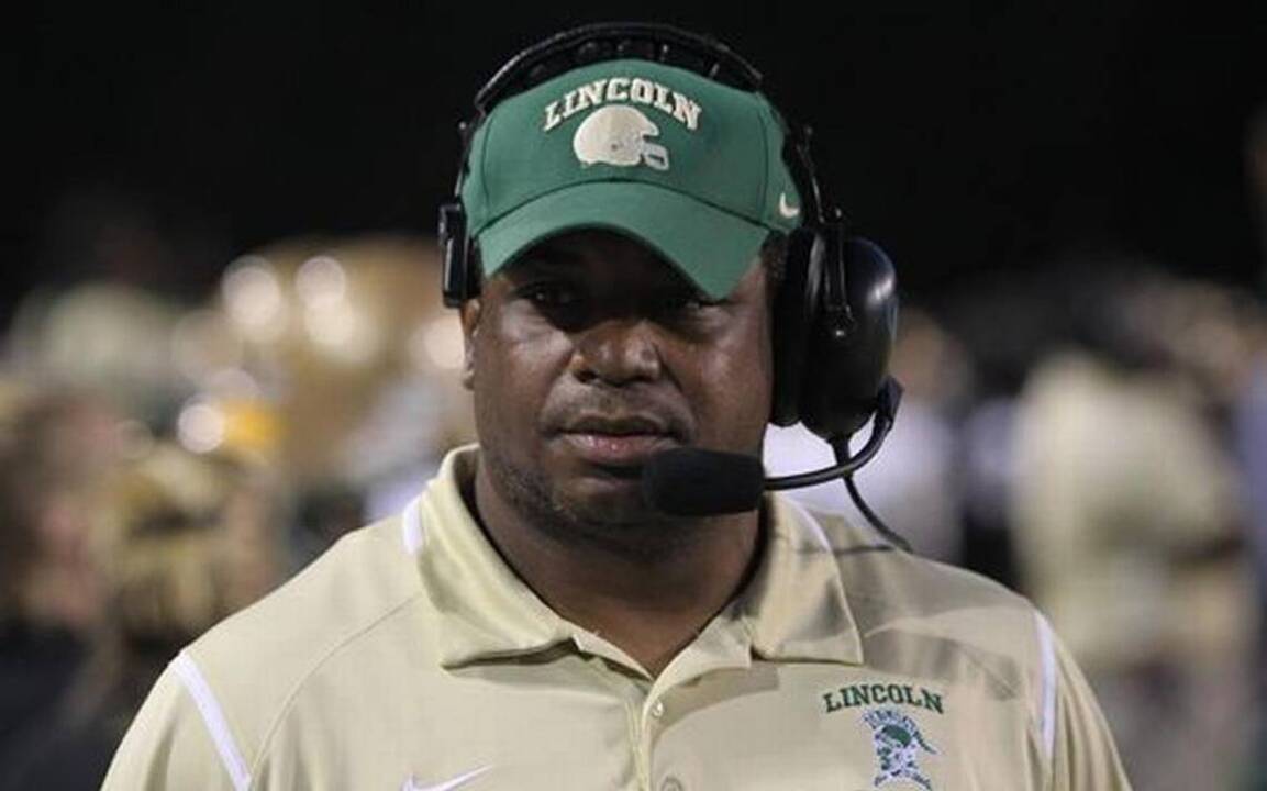 Manatee football players meet new coach Yusuf Shakir