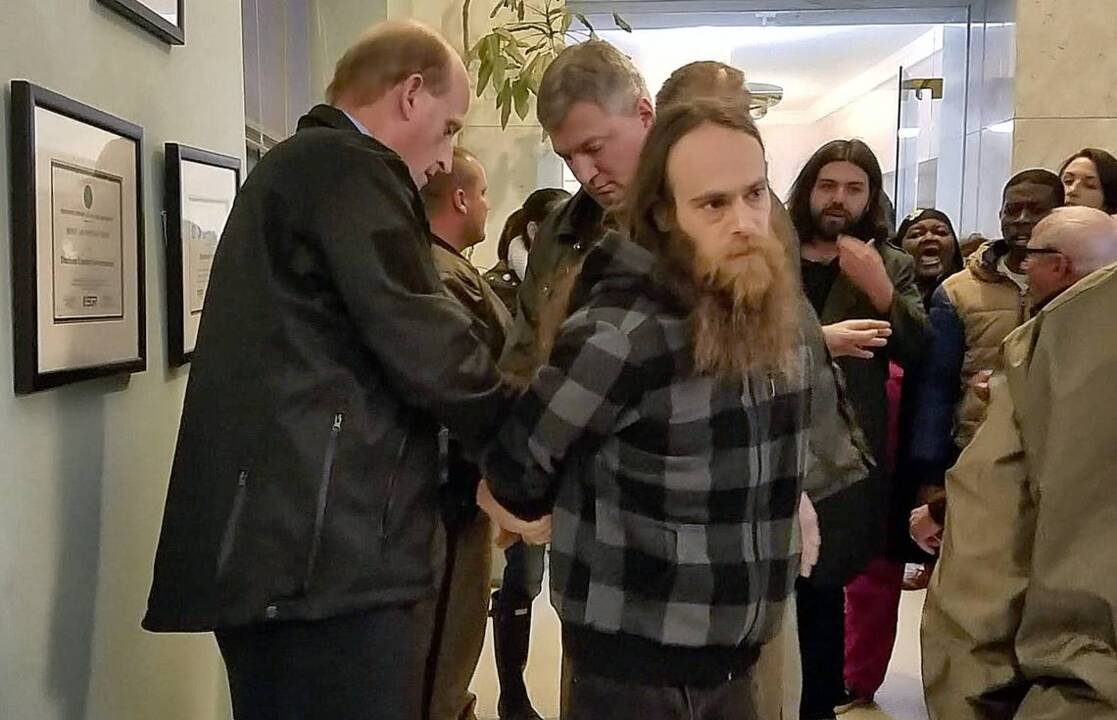 Four arrested at the Durham County Commissioners meeting took deals. One wants a trial.