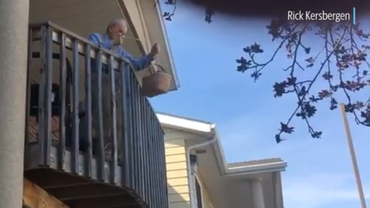 Watch daughter deliver goods to her quarantined senior parents via basket system