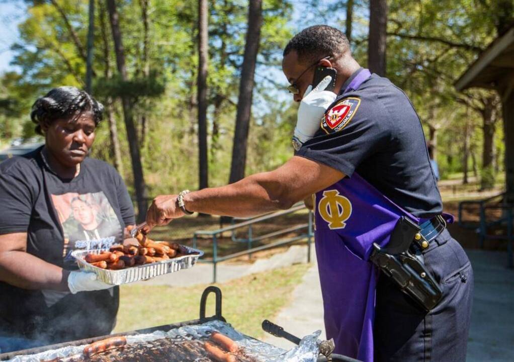 McDougald Terrace residents, police bridge divide over lunch