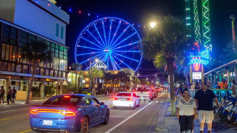 Hot summer night in Myrtle Beach. Visitors are arriving for July 4th weekend.