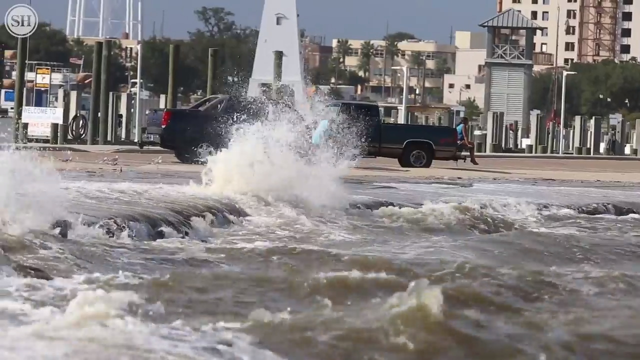 Coast no longer under storm watch, but wind, flooding advisories in effect