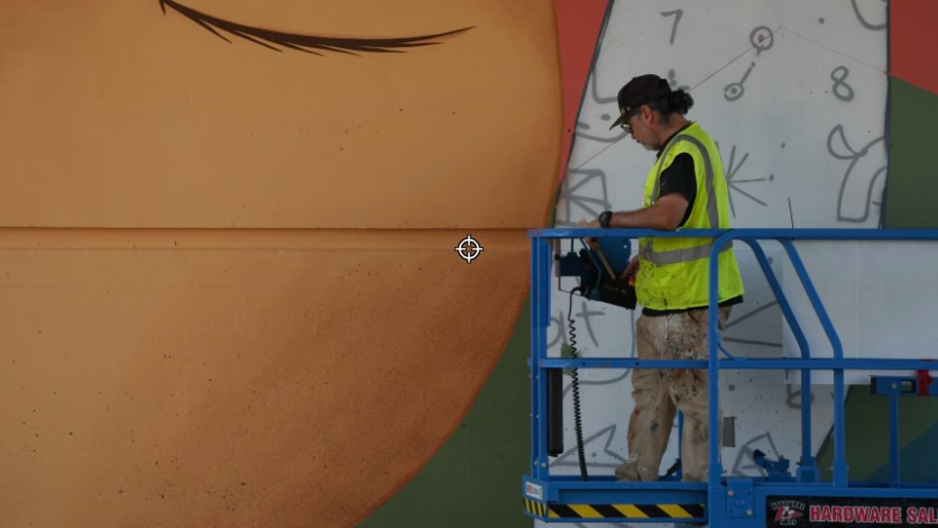 Watch Denver-based street artists bring "abstract landscape" to Bellingham I-5 underpass