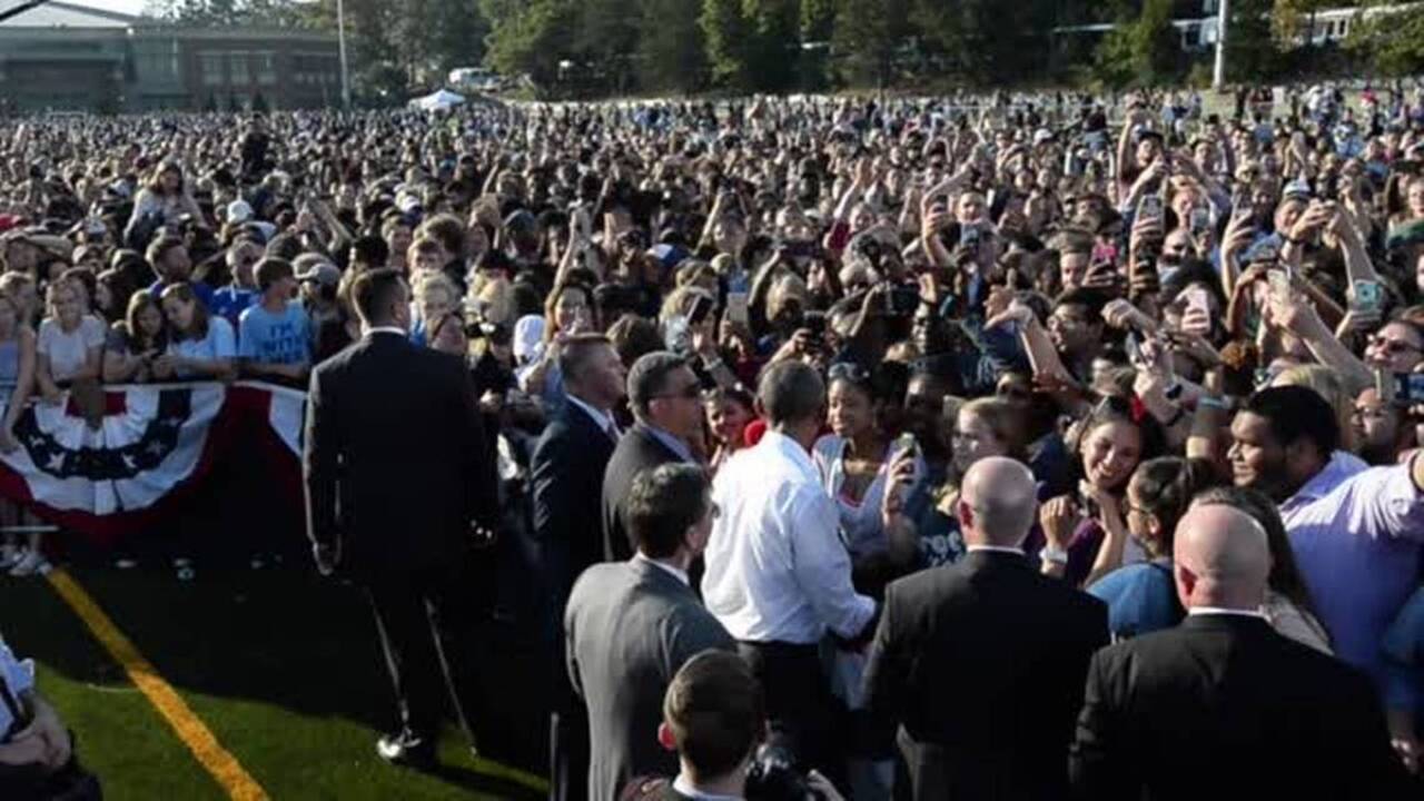 President Obama works the crowd at Chapel Hill rally for Hillary Clinton