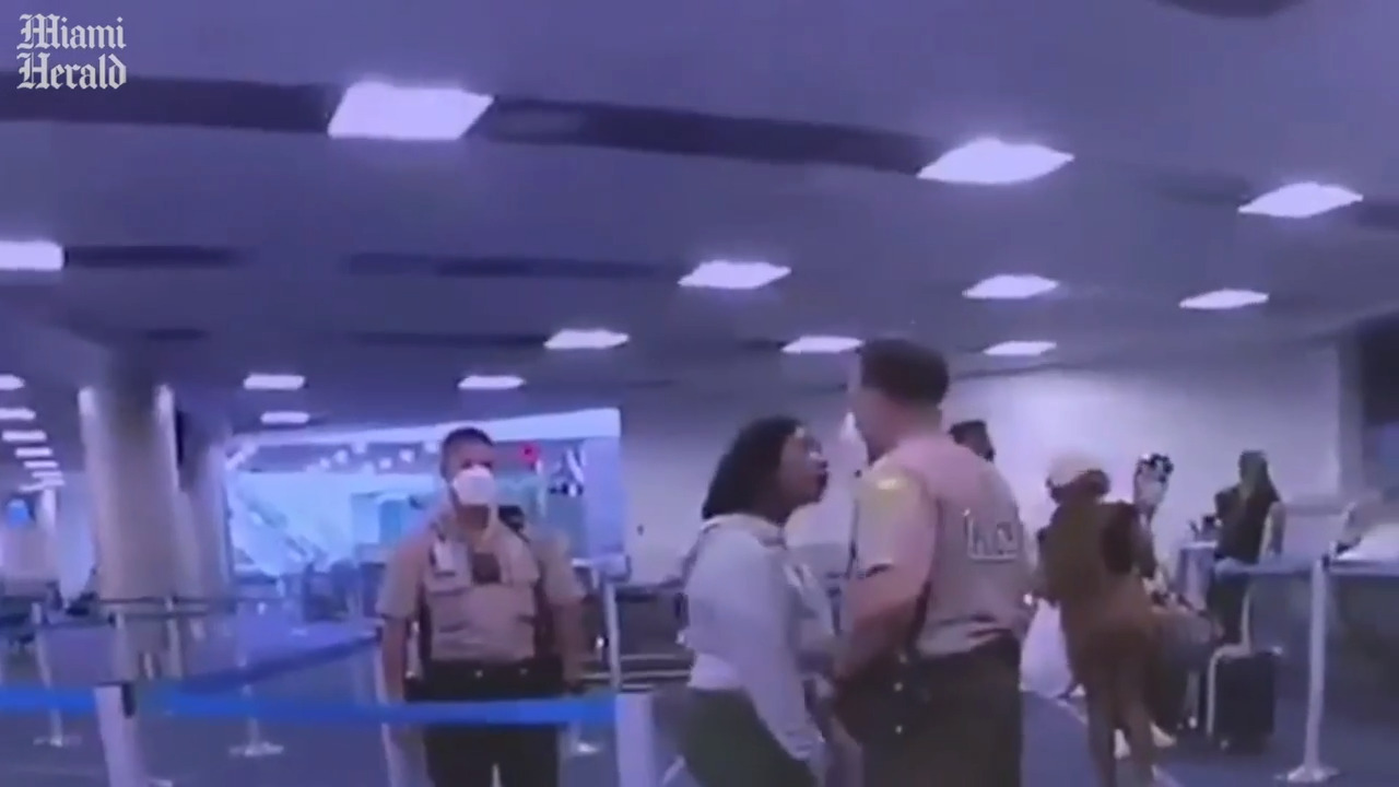 Miami-Dade police moving to fire officer who hit woman at MIA | Miami ...