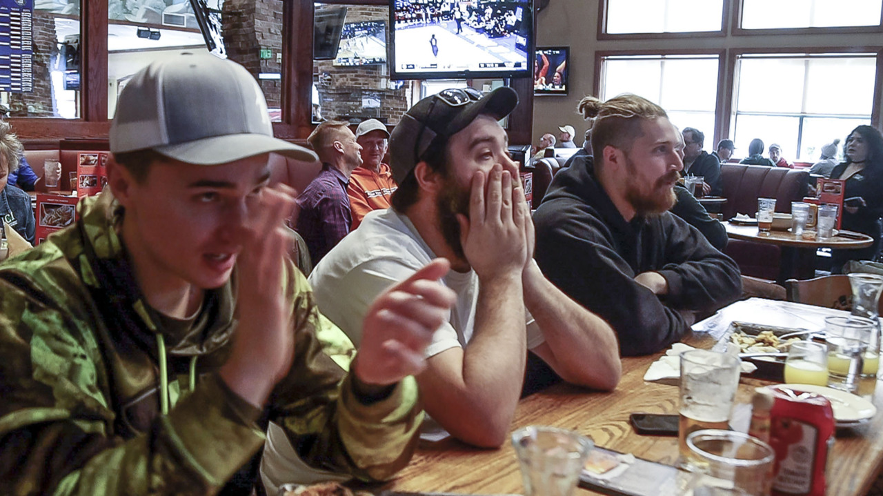 Boise State fans watch Broncos in the NCAA at sports bar