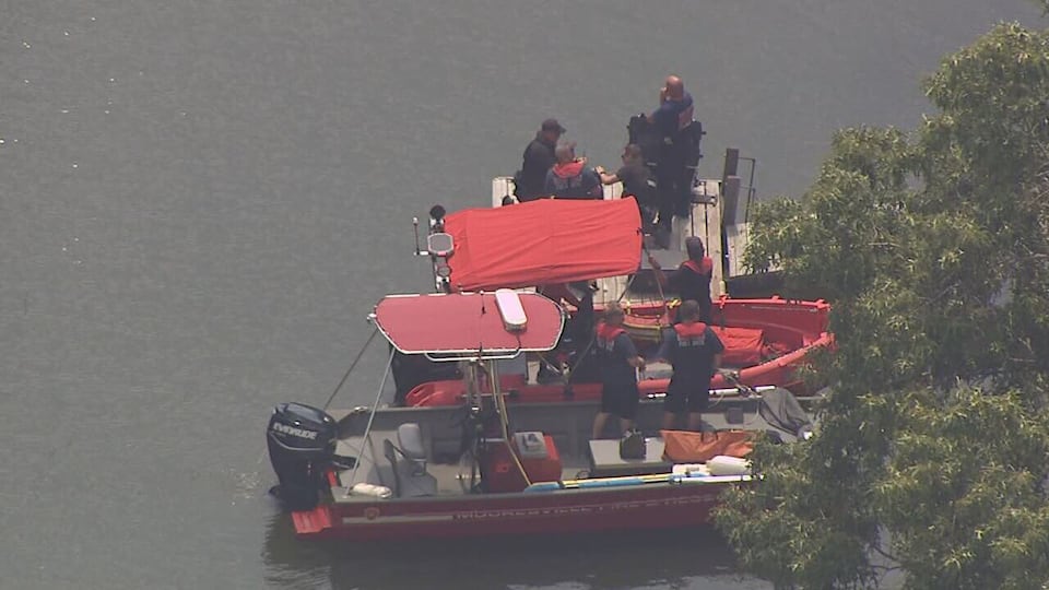 Rescue teams locate body of missing boy near dock at lake house