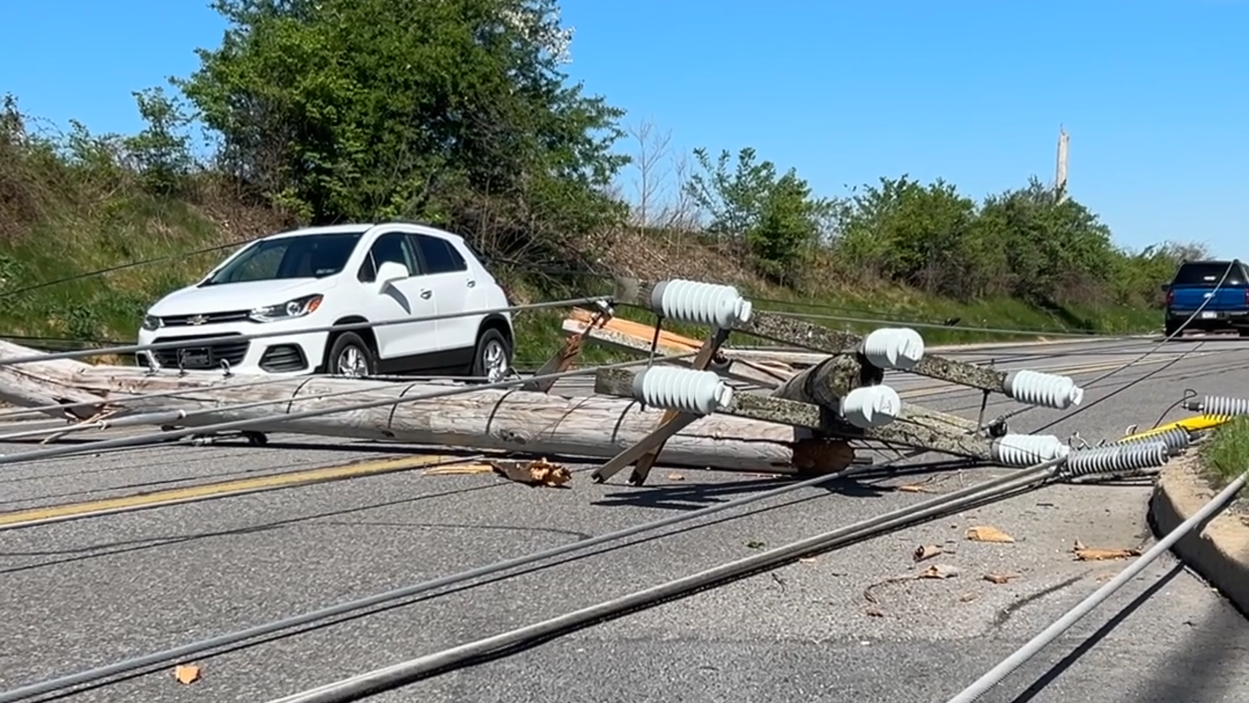 See damage to utility poles on West College Ave. from Tuesday’s storm