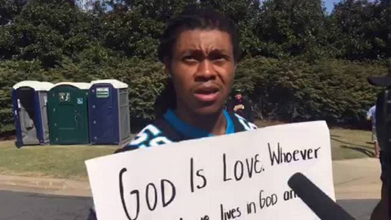 Protesters give police hugs, explain their cause