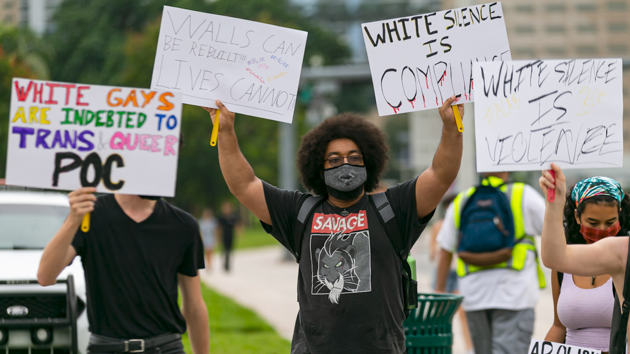 Activists march through downtown Miami in support of Breonna Taylor