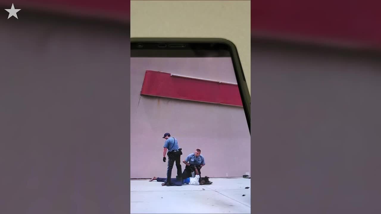 Video of police officers forcibly arresting Breona “BB” Hill on a Kansas City sidewalk