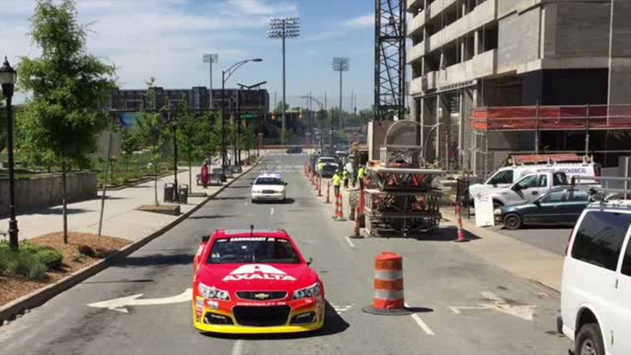 Dale Earnhardt Jr. drives race car on North Carolina city streets