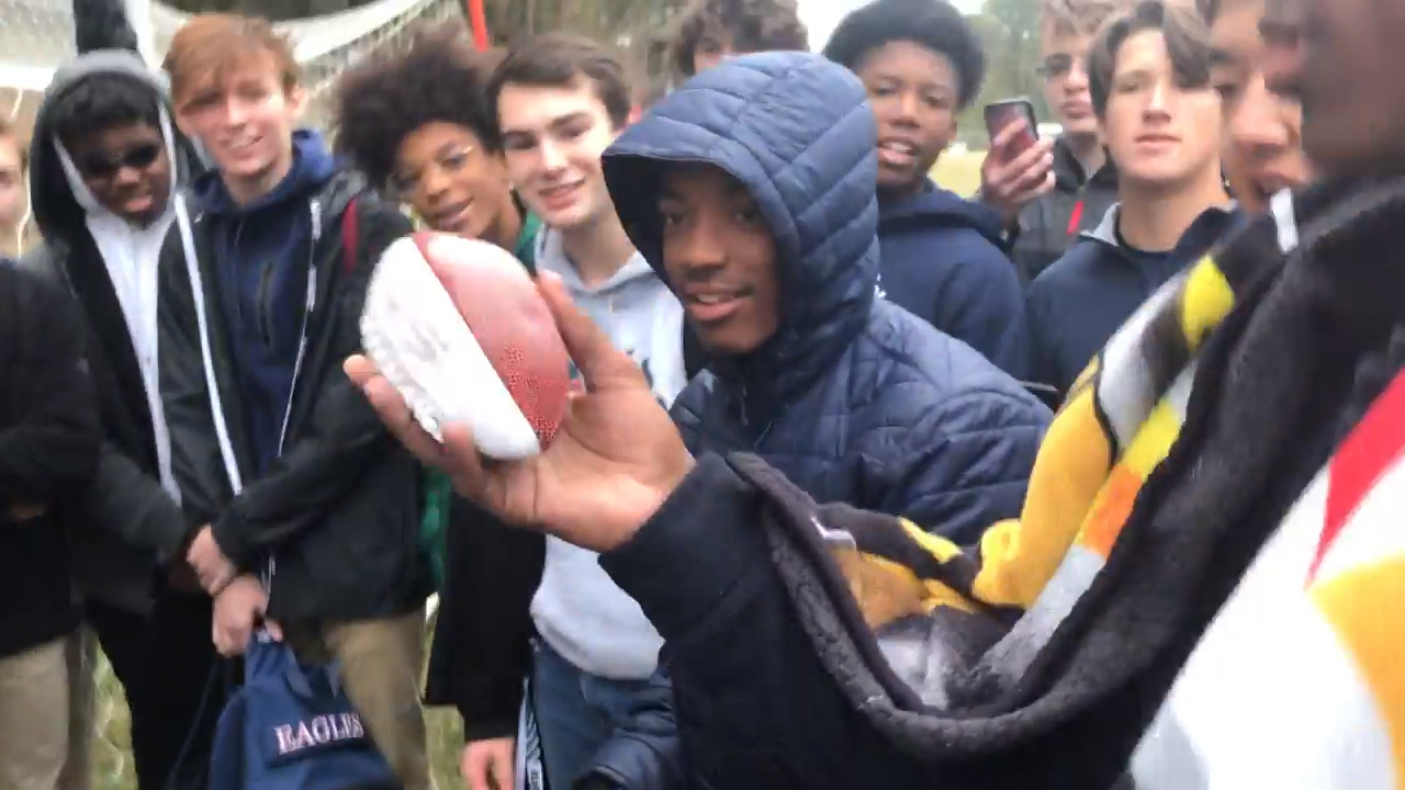 The Grace Christian football team digs up a football they buried back in August