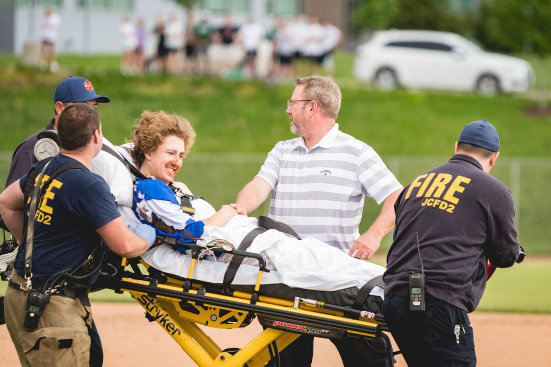An Olathe teen collapsed during a baseball game. His coach helped save his life.