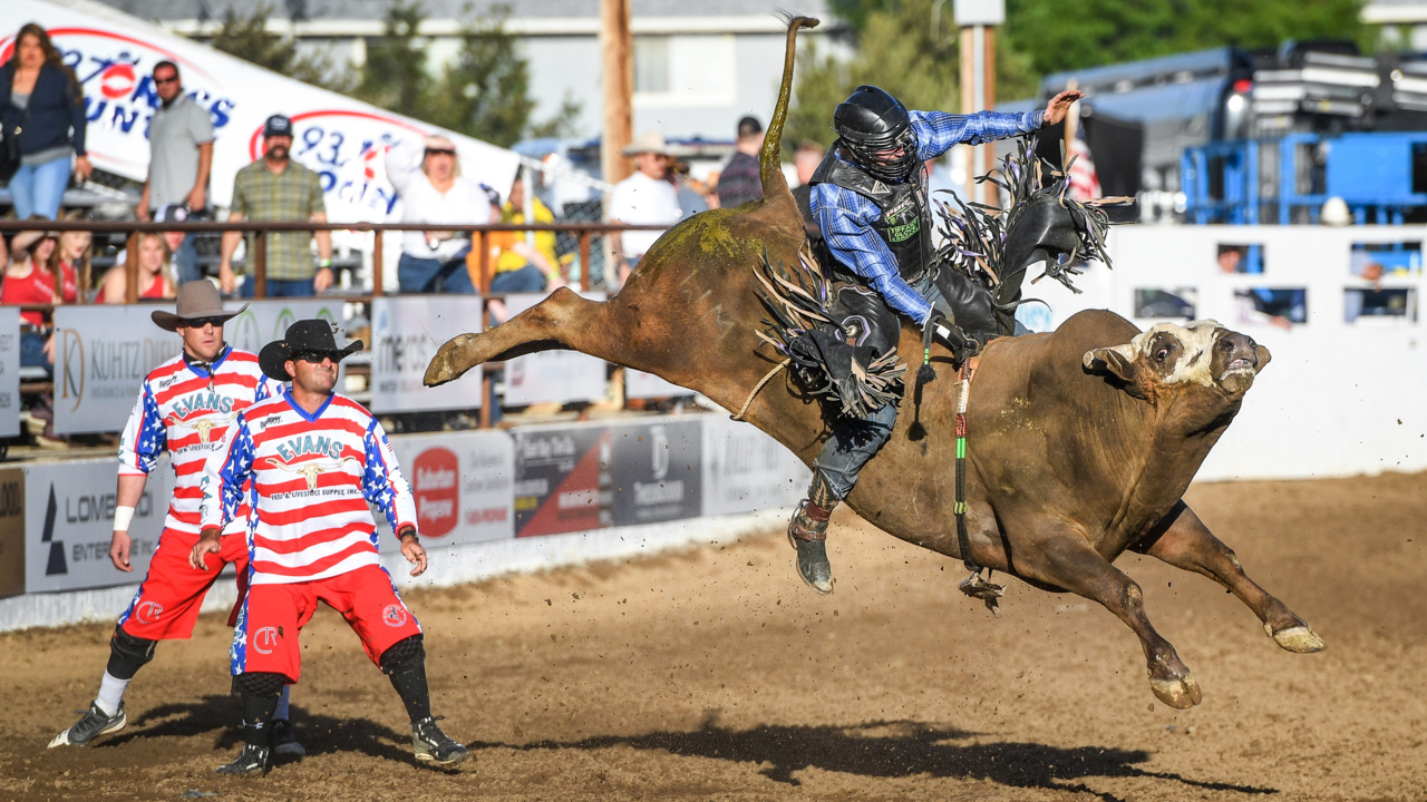 Check out bull riding action on the first day of the Clovis Rodeo