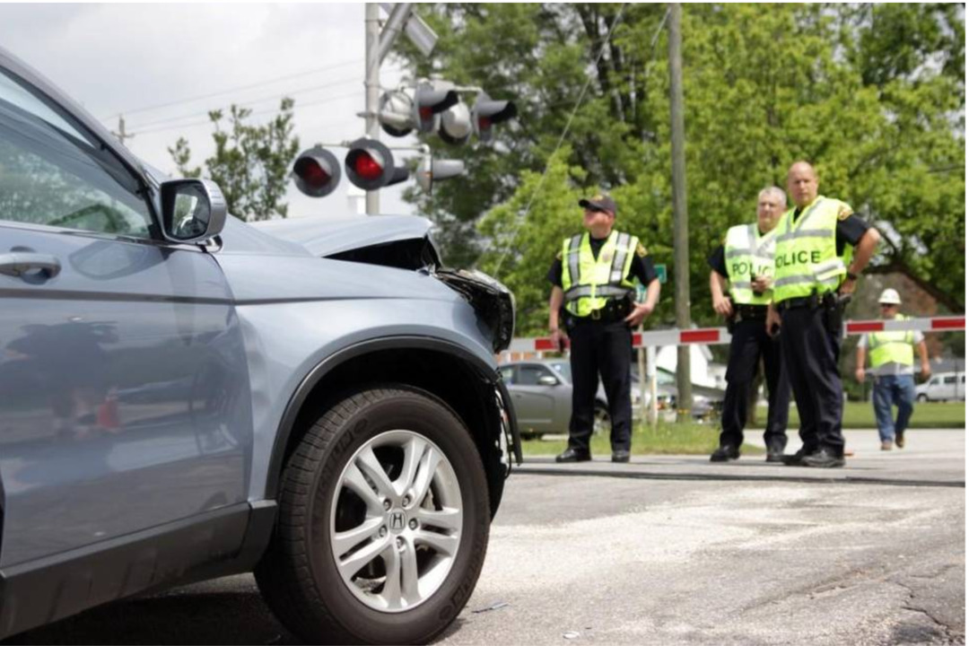 Woman narrowly escapes serious injuries after Amtrak train strikes car at crossing